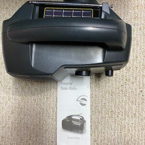 Freeplay Self-Powered Solar Power and Hand Crank AM/FM Portable Radio-New in Box